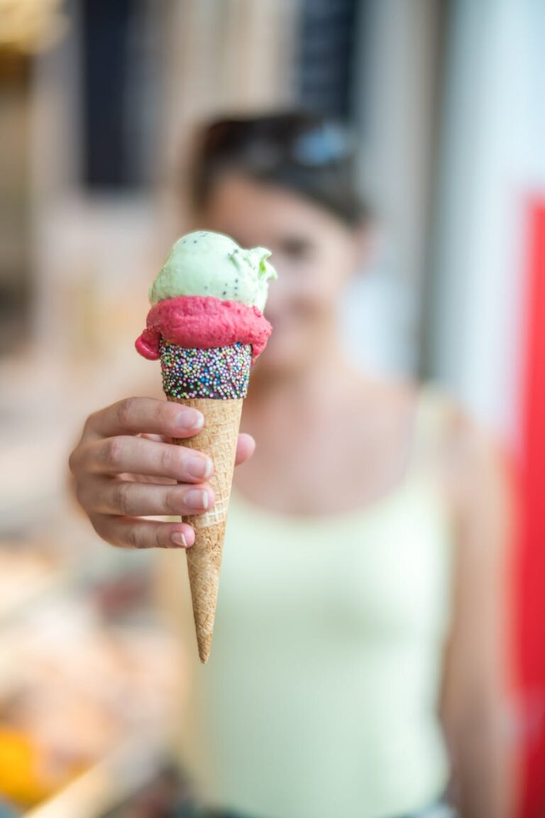 DG Speaks - Food - Events - DC Scoop Ice Cream Festival - Girl enjoying an ice cream cone outside at DC Scoop event.