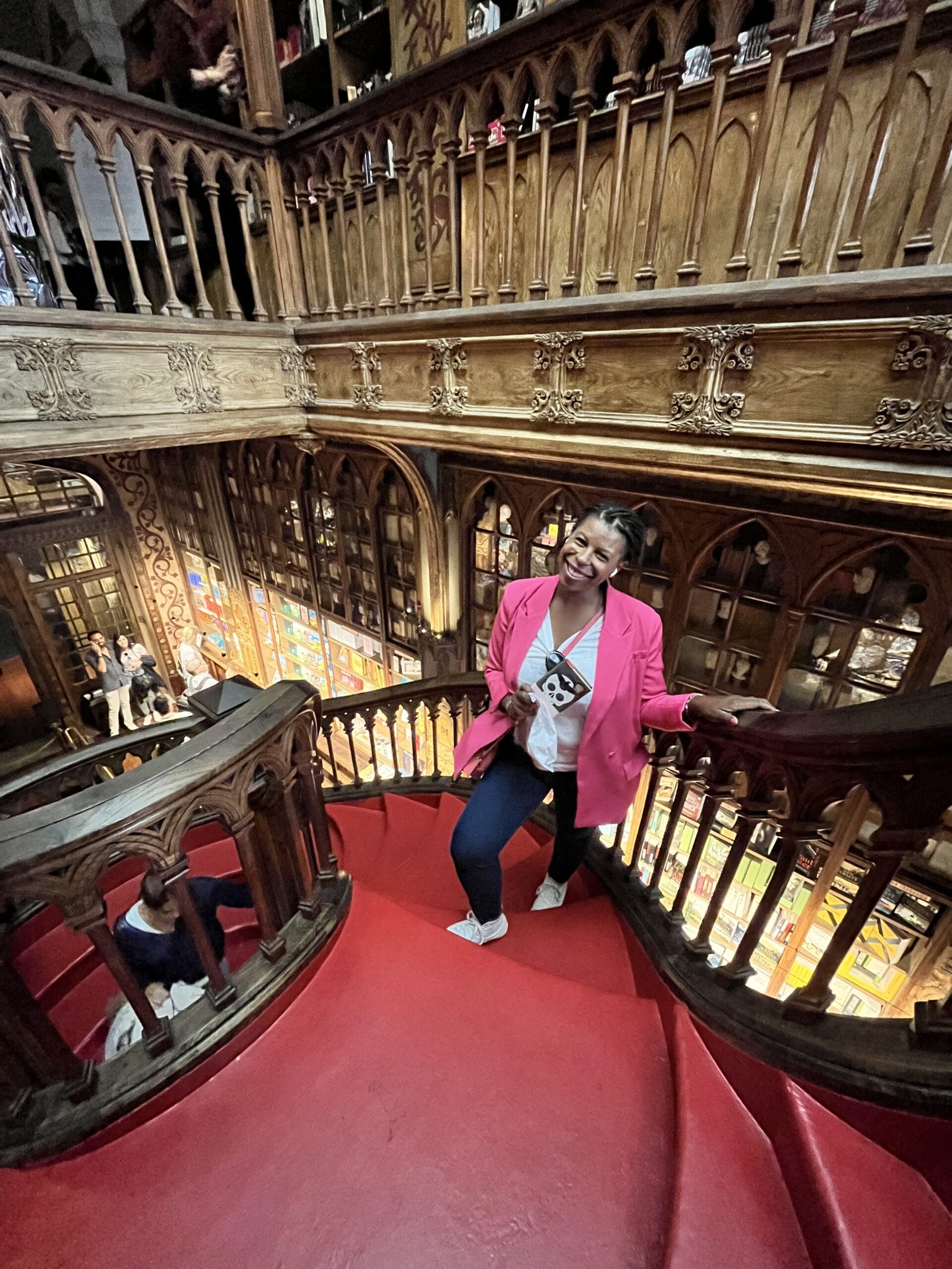 DG Speaks - Lifestyle - Color Pallet - Mercedes out sightseeing in Porto with pink blazer, blue jeans, and white tee