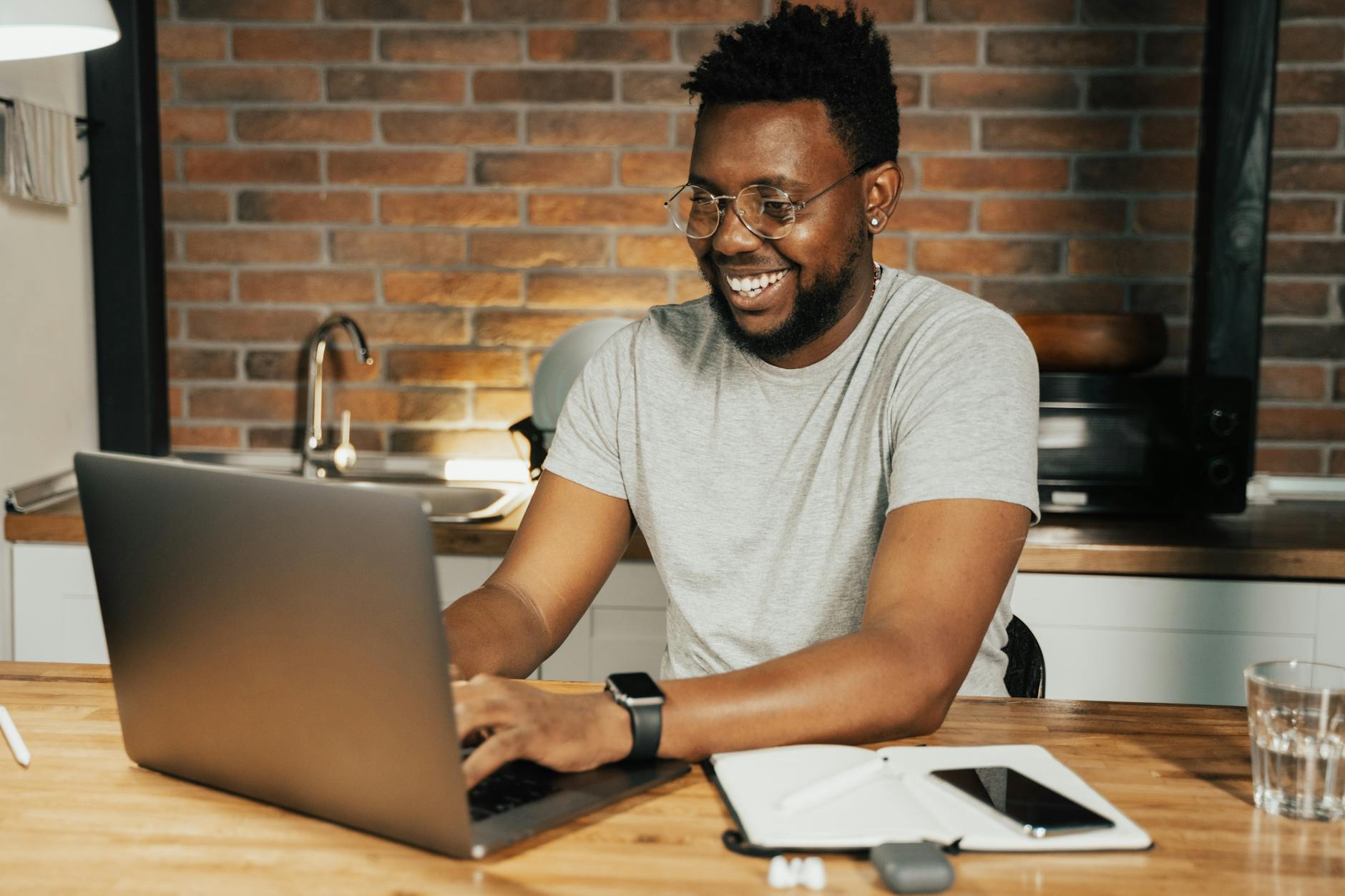 DG Speaks - Travel - Man using a laptop to participate in online focus group