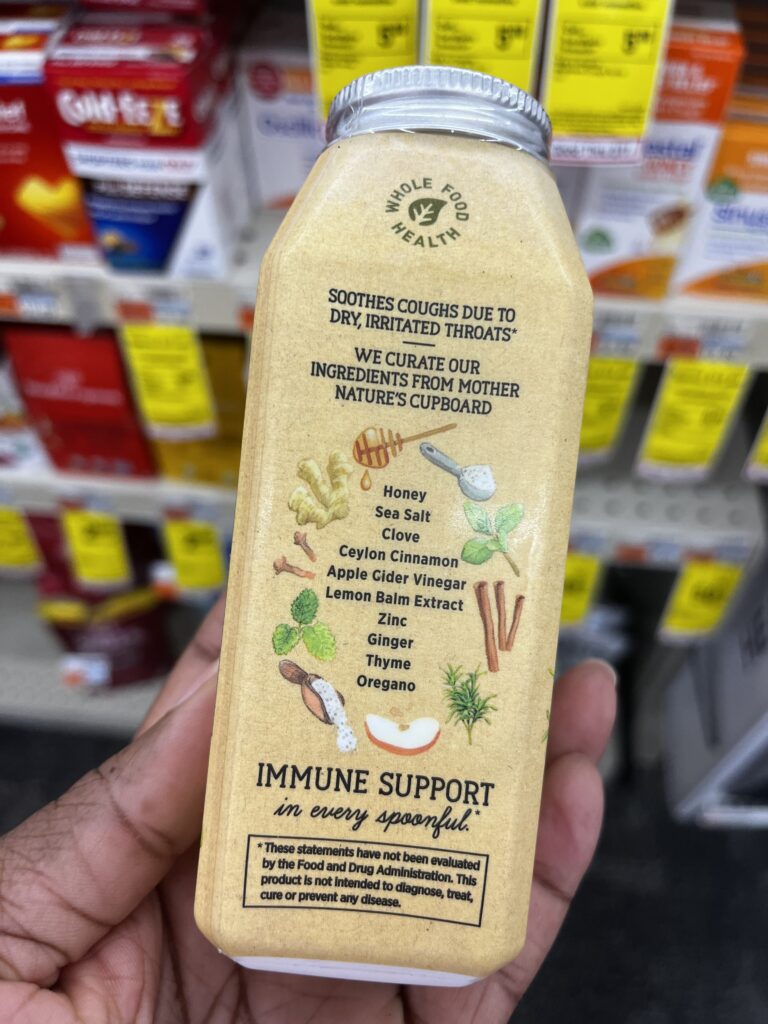 DG Speaks - Money - Food Consulting - Packaging - Mercedes displaying Whole Food Health Immunity Support Smoothie bottle with clearly marked ingredients.