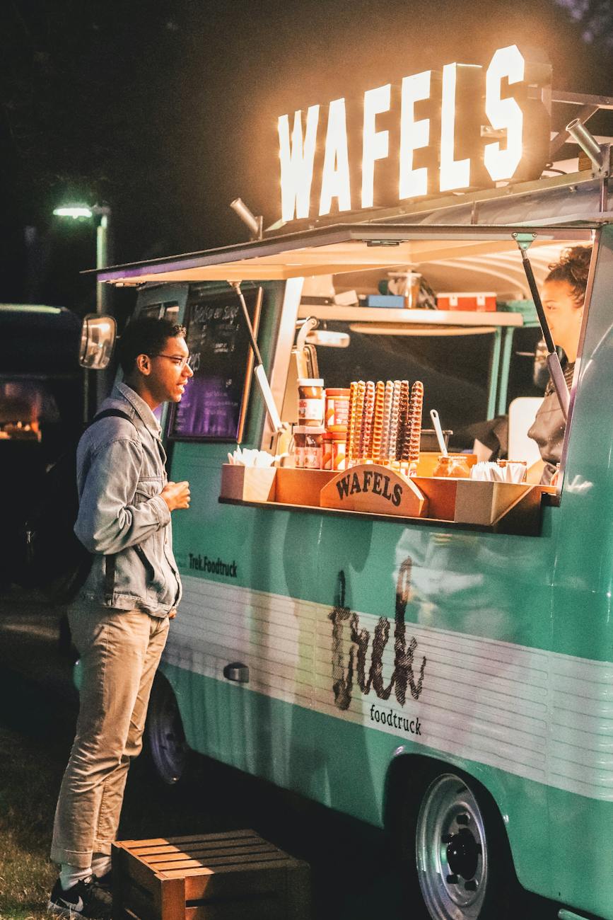 DG Speaks - Money - Food Consulting - Marketing - Colorful food truck parked on the street representing marketing for food businesses.