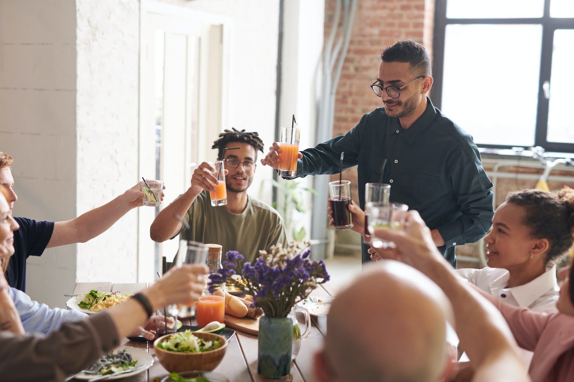 DG Speaks Lifestyle - Thanksgiving - Group of friends making toast