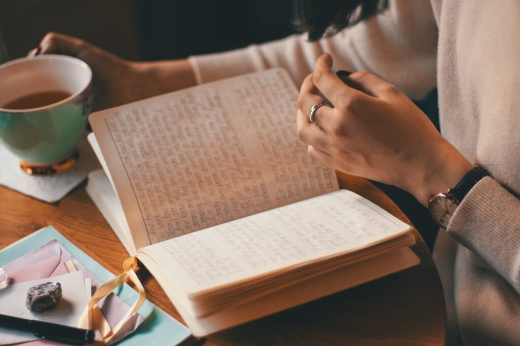 DG Speaks - Lifestyle - Wellness - Journaling - photo of person holding cup