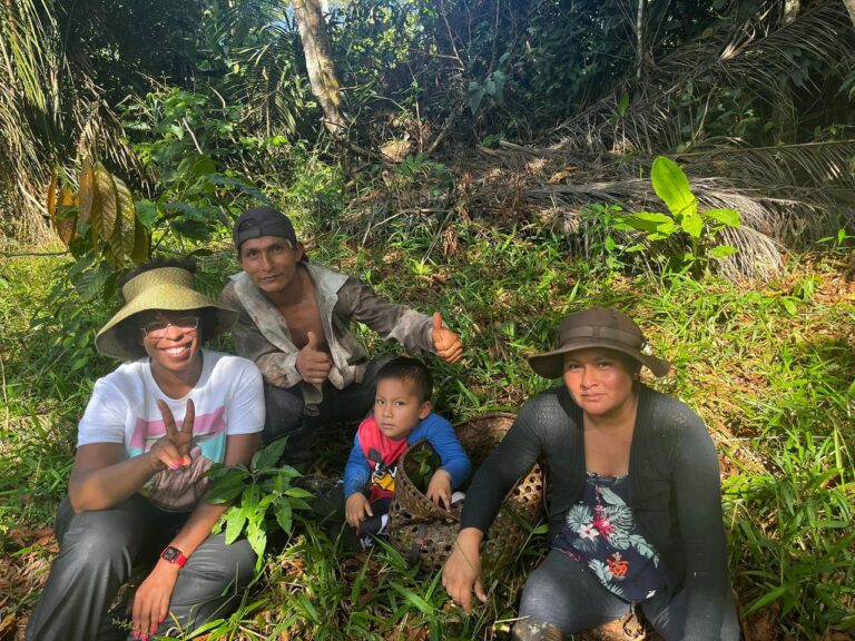 DG Speaks - Sustainable Development - Mercedes with indigenous family in Ecuador hunting for palm grubs