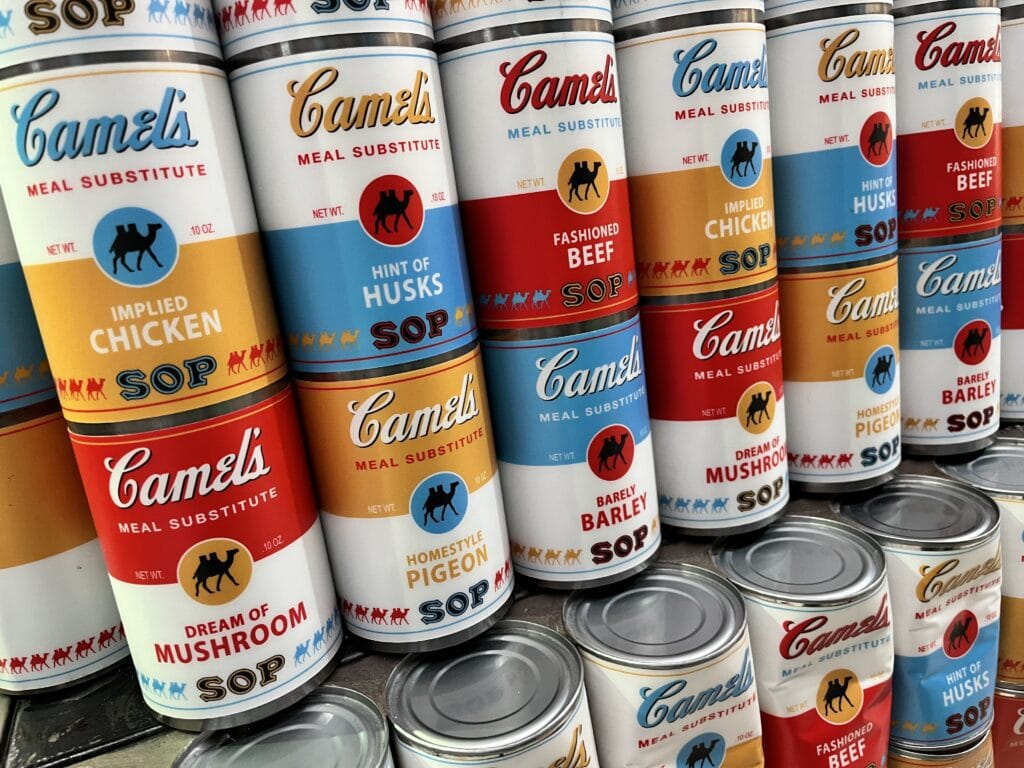 DG Speaks - Money - Food Consulting - Packaging - Gag cans mimicking Campbell Soup at Omega Mart, Las Vegas.