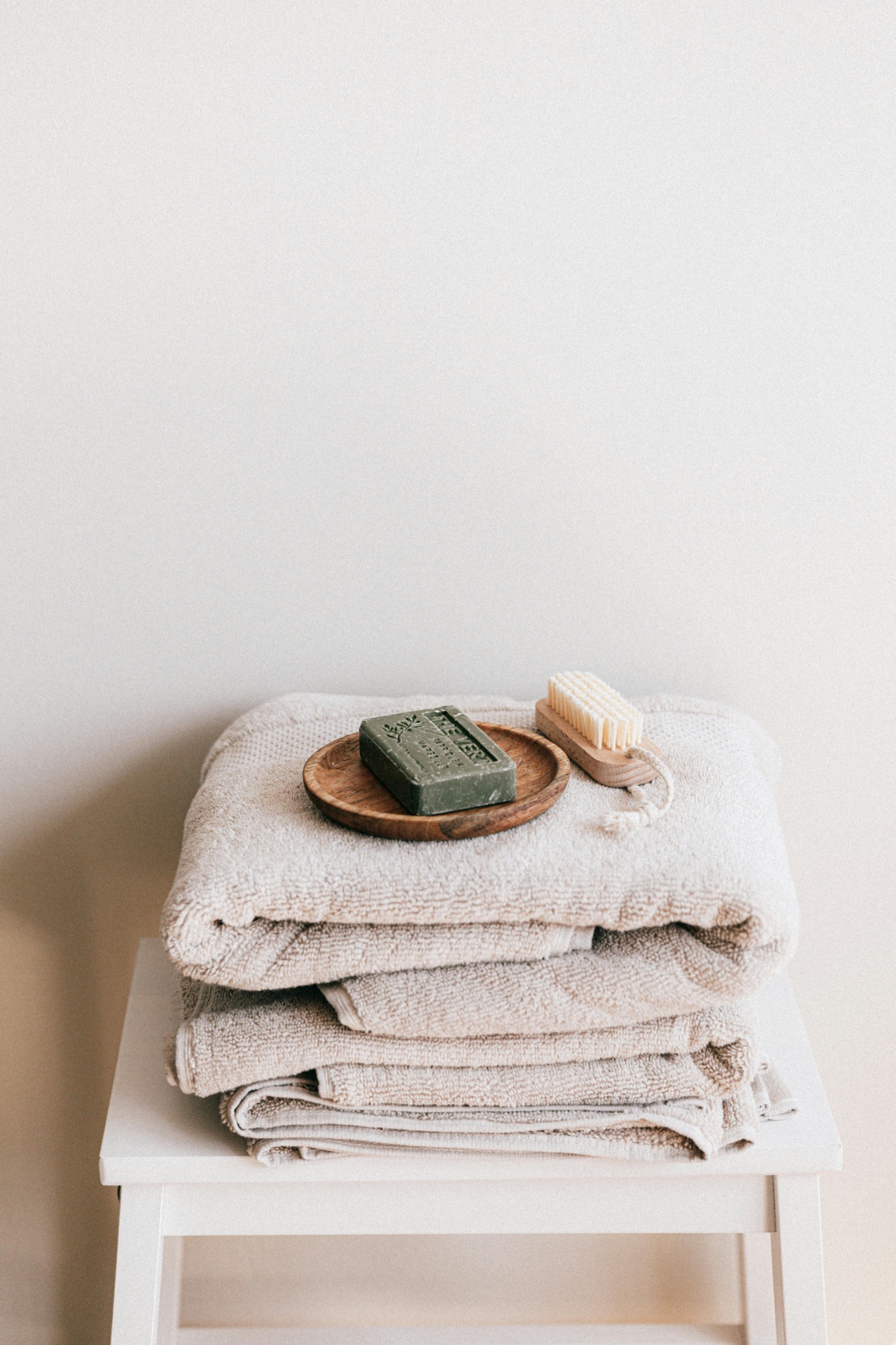 DG Speaks - Lifestyle - Money - A stack of beautifully laid fresh towels, ready to elevate your hosting experience