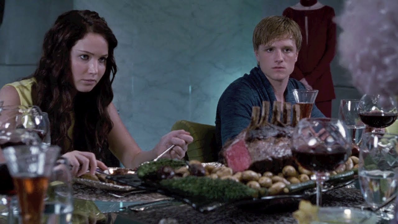 Characters enjoying a meal - The Hunger Games and the Power of Food
