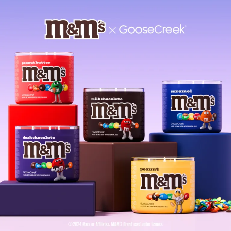 M&M’S™ x Goose Creek Holidays Candles showing the entire collection in red, brown, yellow, blue, and purple