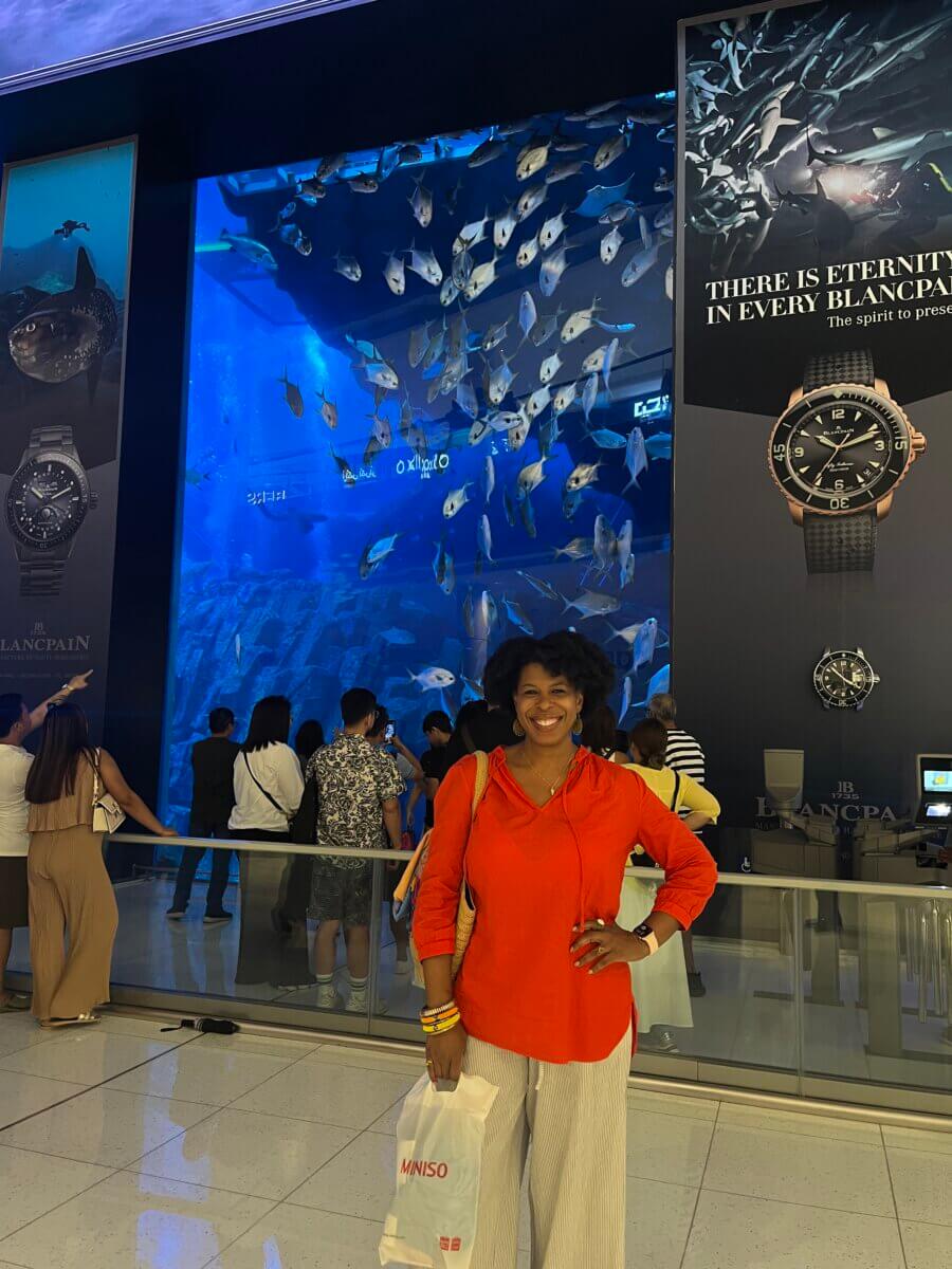Mercedes standing in front of the Dubai Mall aquarium during her 3 days in Dubai.