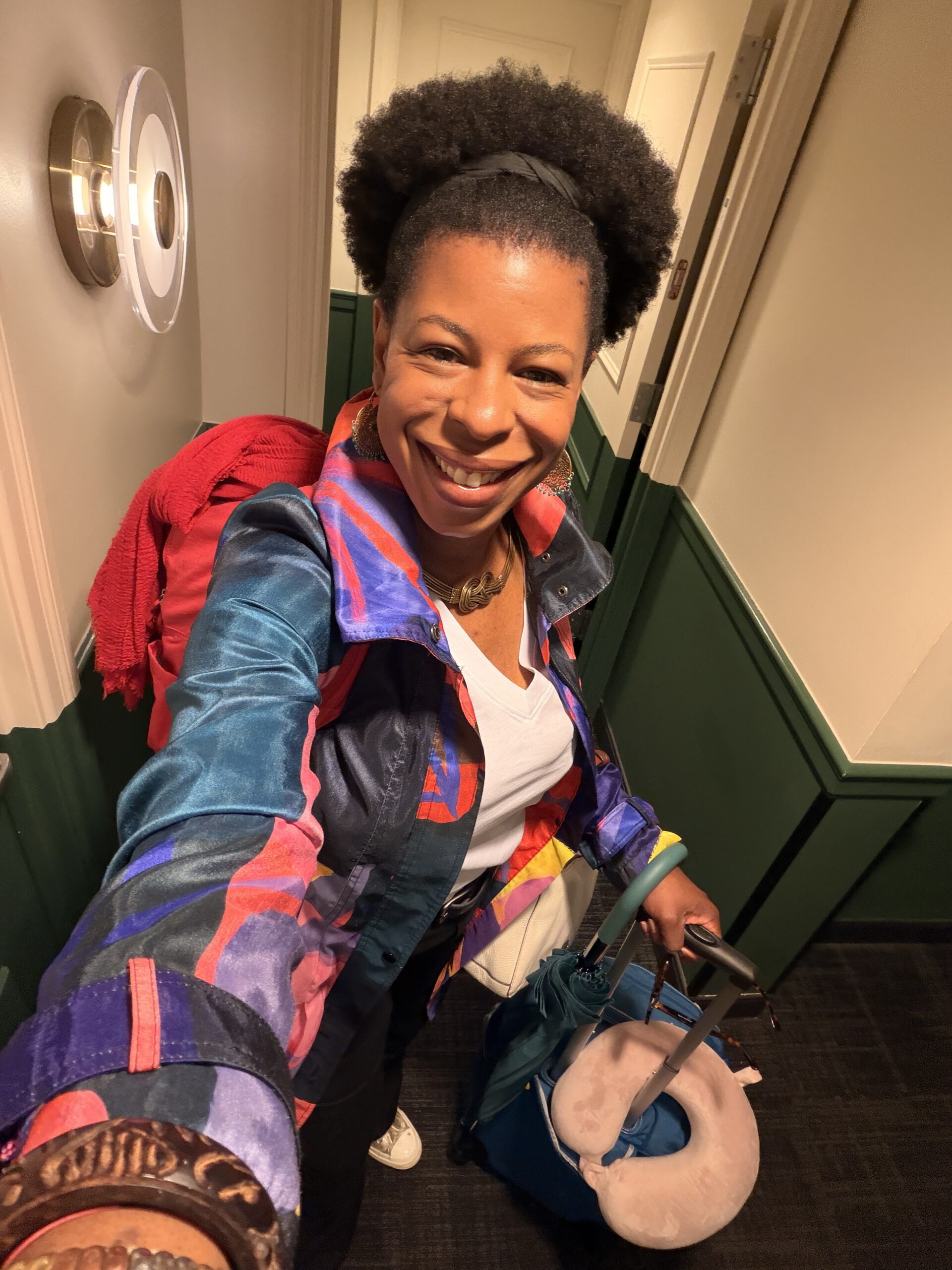 How Travel Changes You - Mercedes traveling with luggage about to set off on an adventure