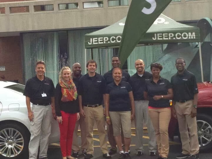 Mercedes Diane Griffin Forbes working as a Jeep product specialist at an automotive promotional event, representing American car culture, experiential marketing, and the emotional branding of mobility and freedom.