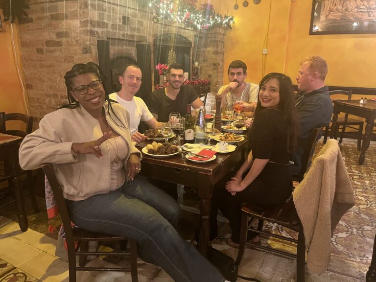Why Food Is the Fastest Way to Understand a Culture - Local food shared around a table as travelers experience authentic culture through cuisine