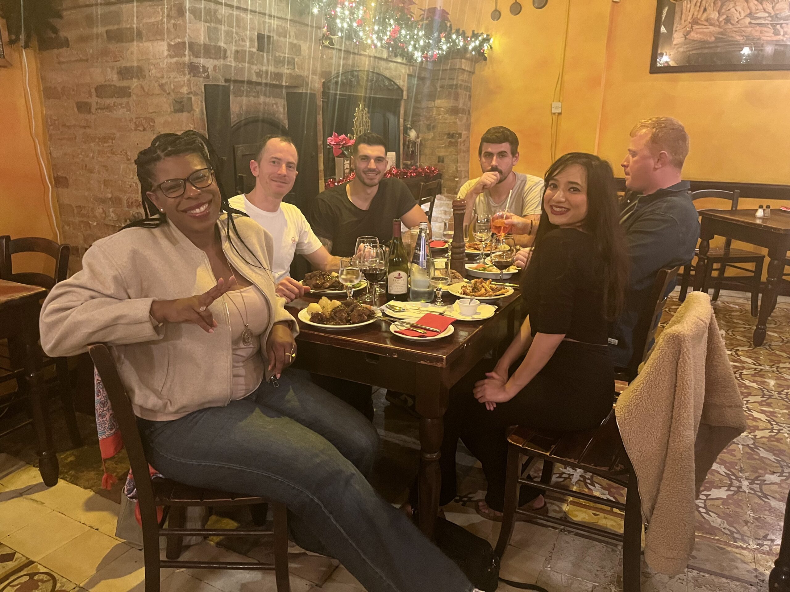 Why Food Is the Fastest Way to Understand a Culture - Local food shared around a table as travelers experience authentic culture through cuisine