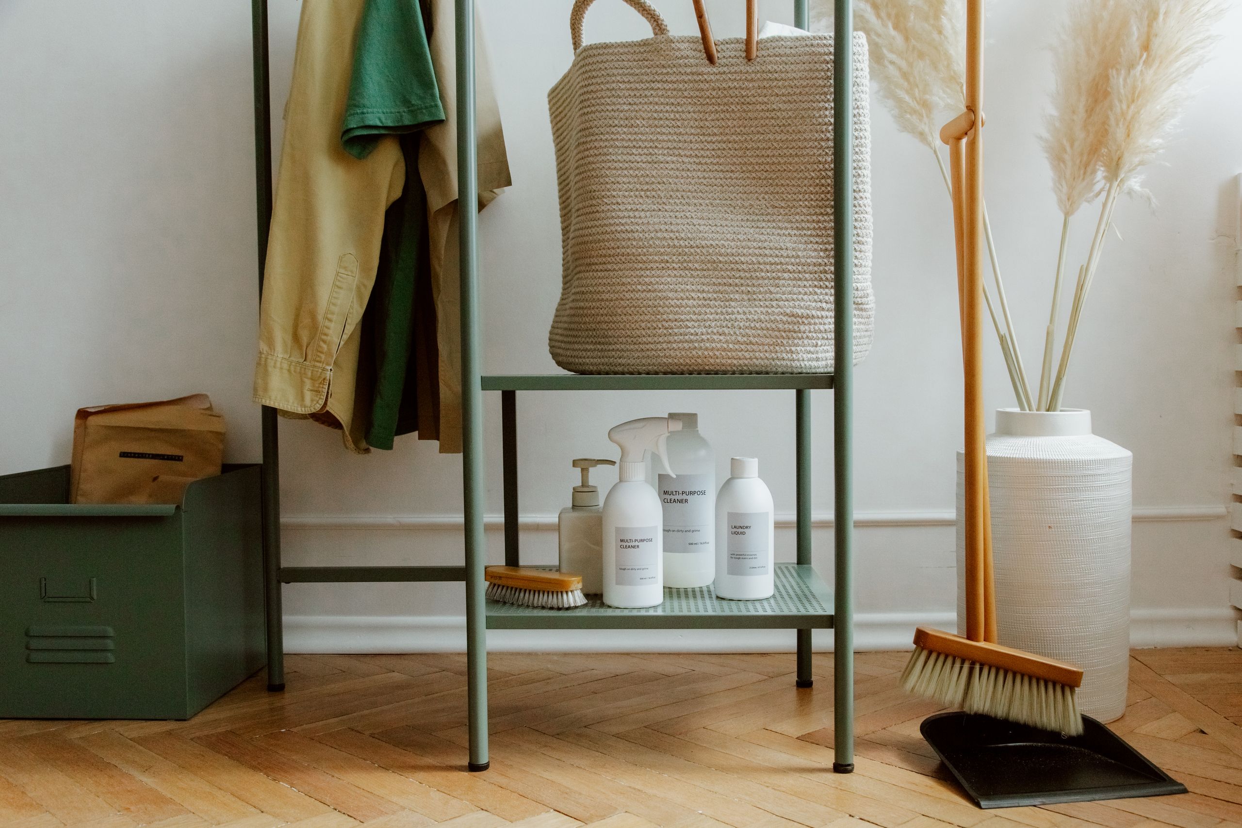 Airbnb Supplies Checklist: The Must-Have Items Every Host Should Keep Stocked - Eco-friendly cleaning products and home storage solutions in a modern, minimalist interior.