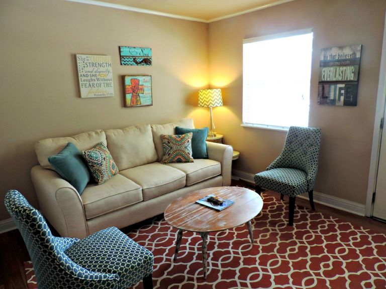 How to Become an Airbnb Superhost Faster: Lessons From 14 Years of Hosting - Bright living room with elegant furniture and modern decor, perfect for relaxation.