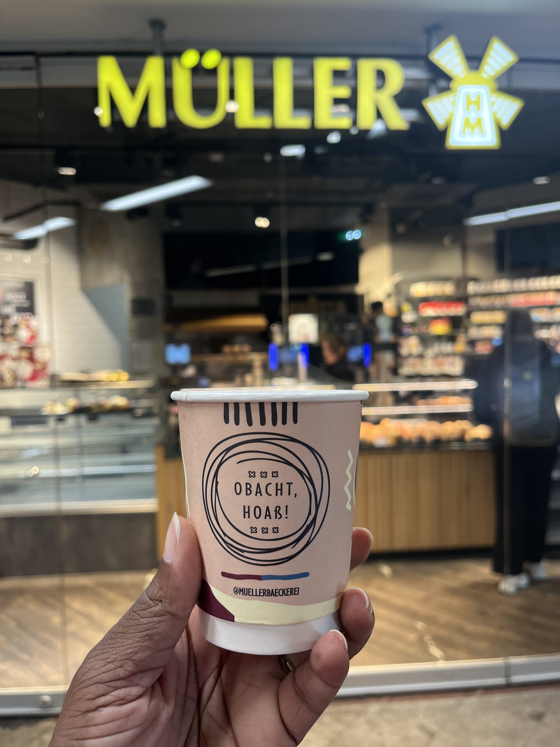 Hot takeaway coffee from Müller bakery in Bavaria