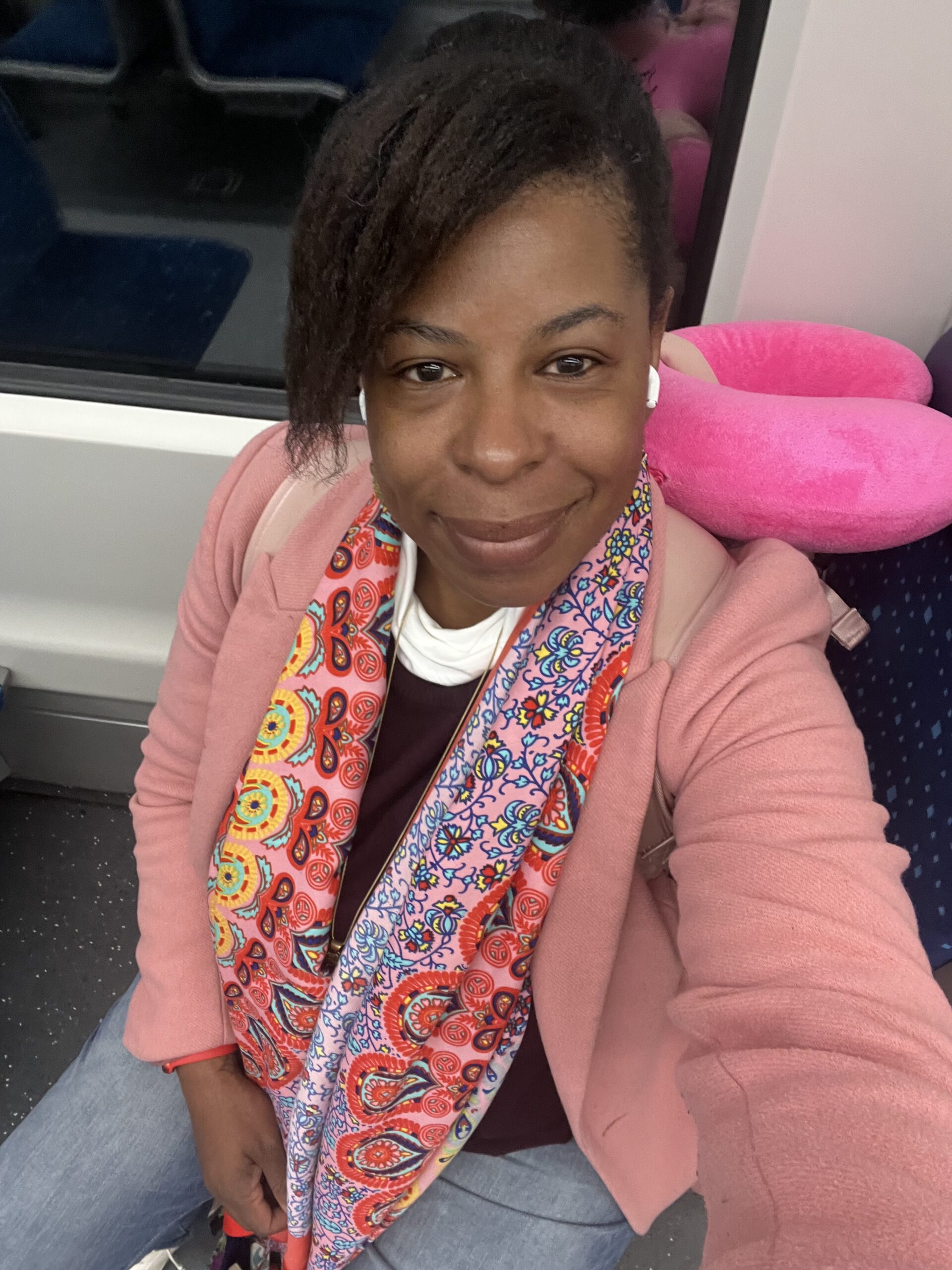 Black woman traveler riding a train through Bavaria