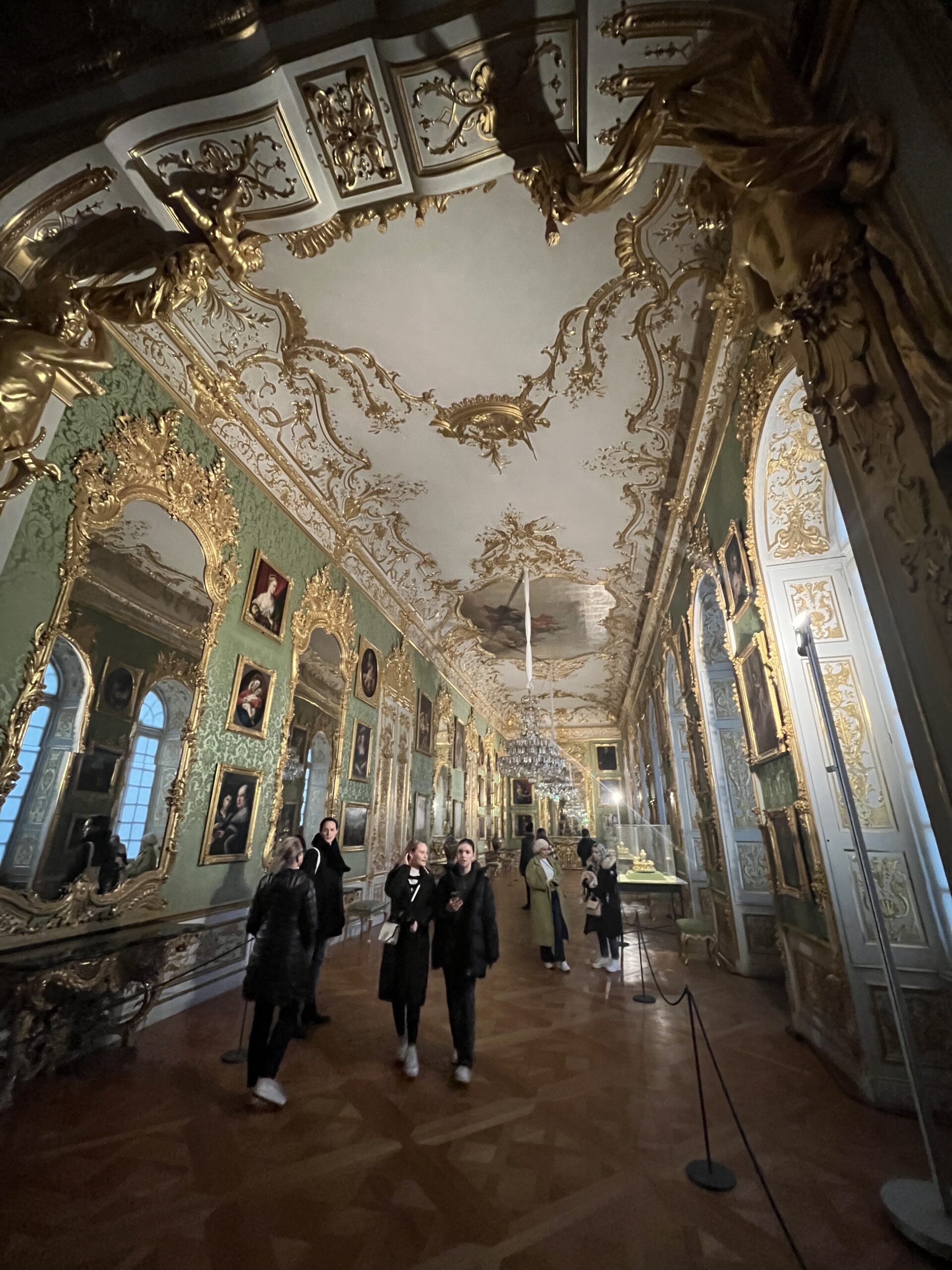 Green Gallery with gilded frames and mirrors at the Munich Residenz
