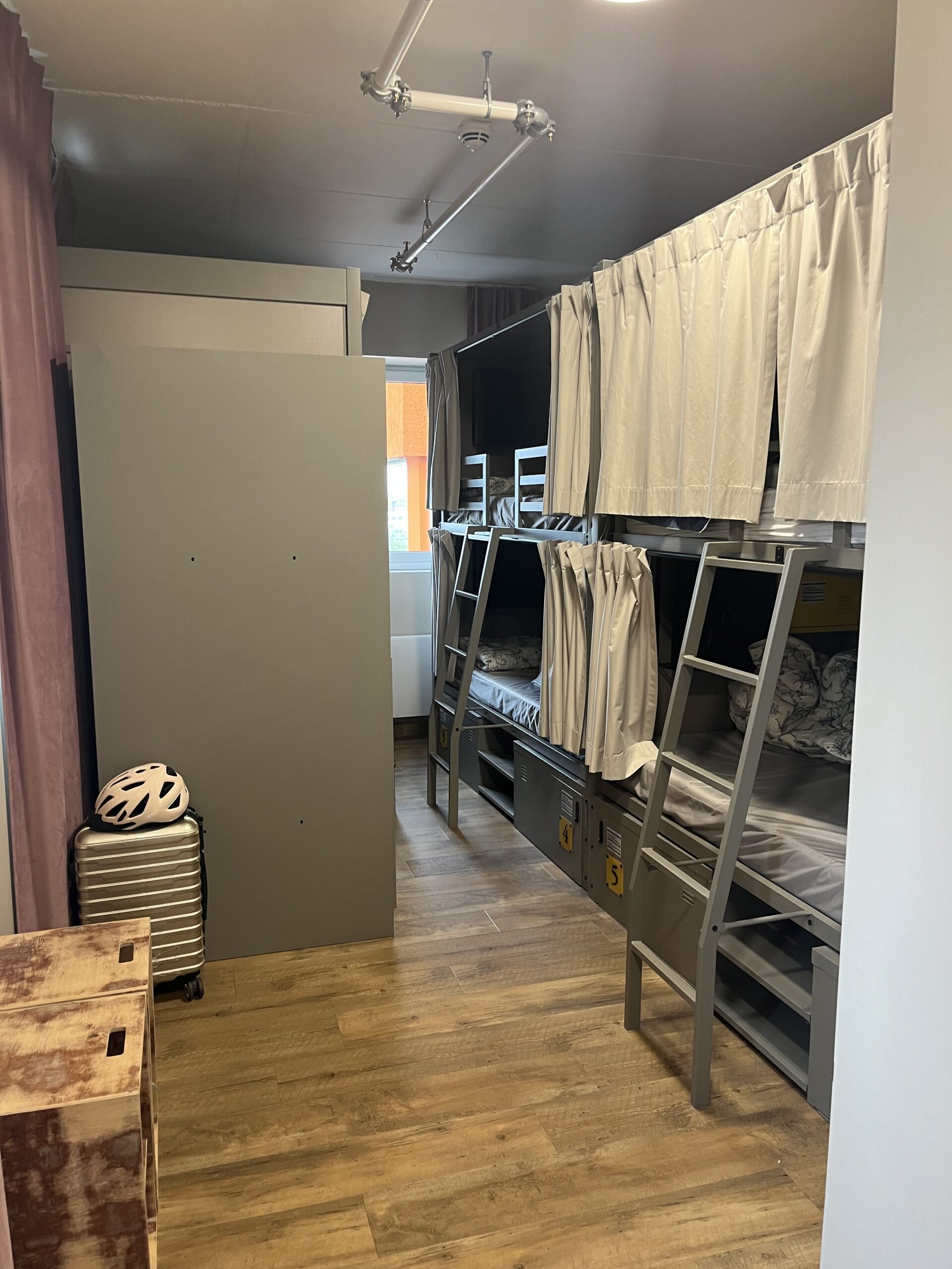 Modern curtained dorm beds at Wombat’s Munich Werksviertel