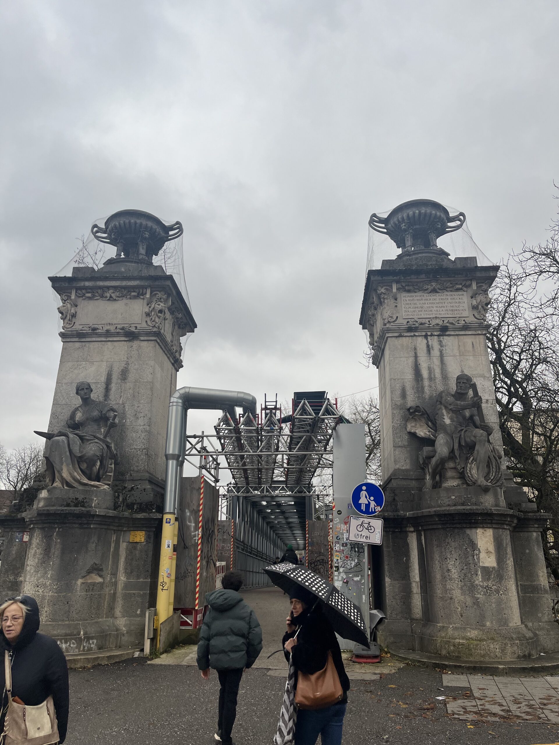 Historic stone pylons at Ludwigsbrücke near the Deutsches Museum Munich