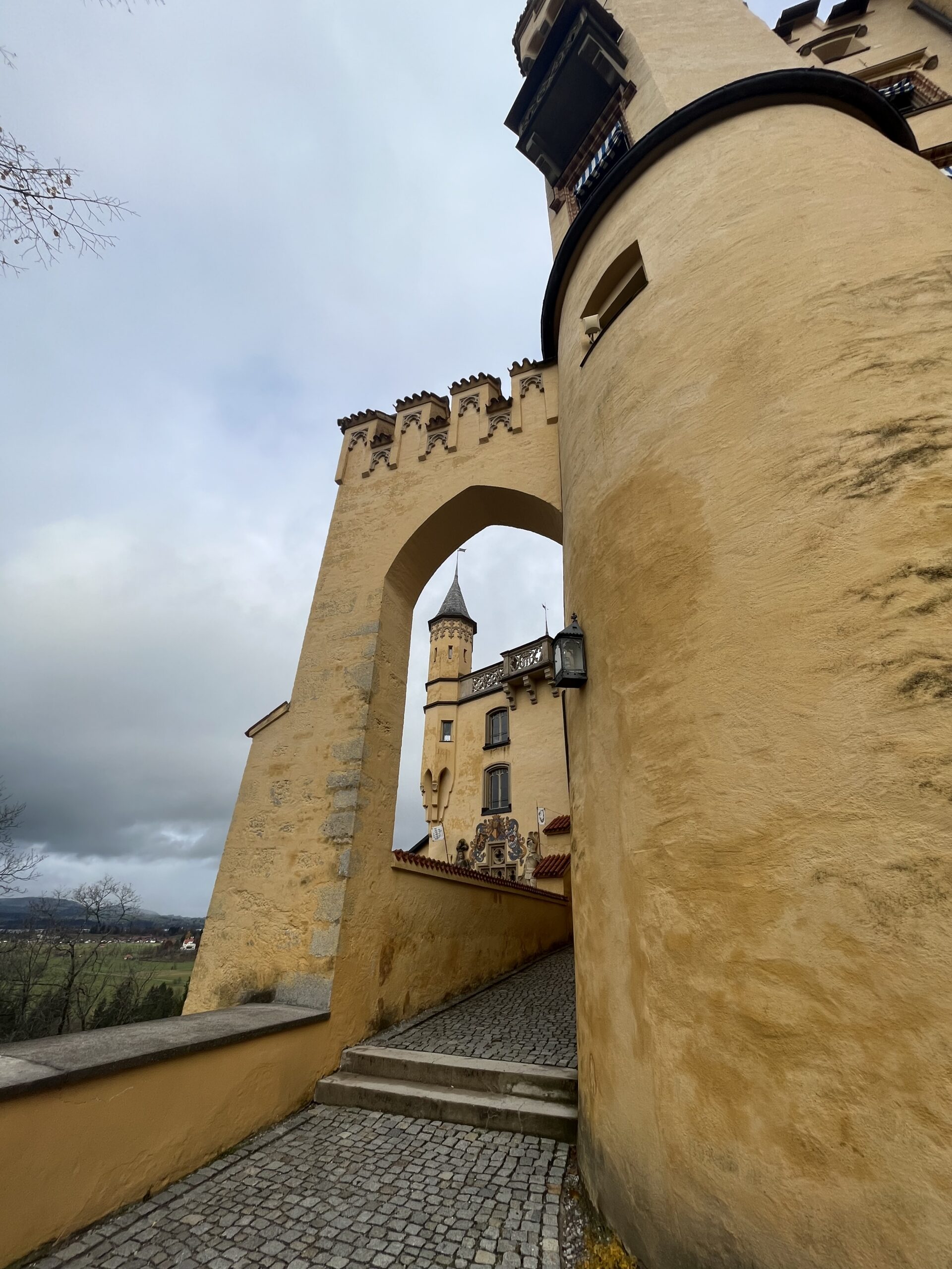 Yellow walls and arched passage at Hohenschwangau Castle