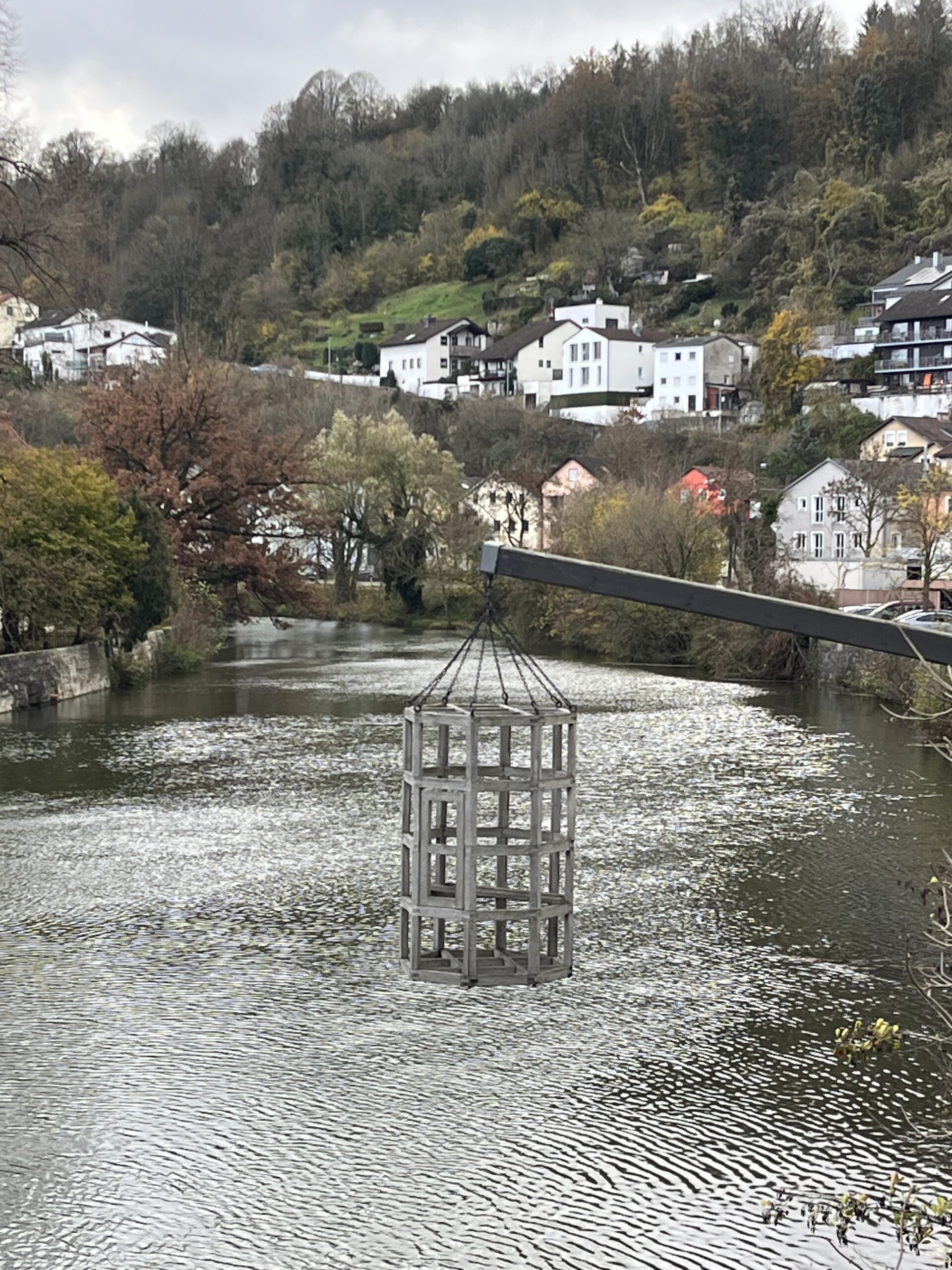Metal cage artwork suspended above the Altmühl River