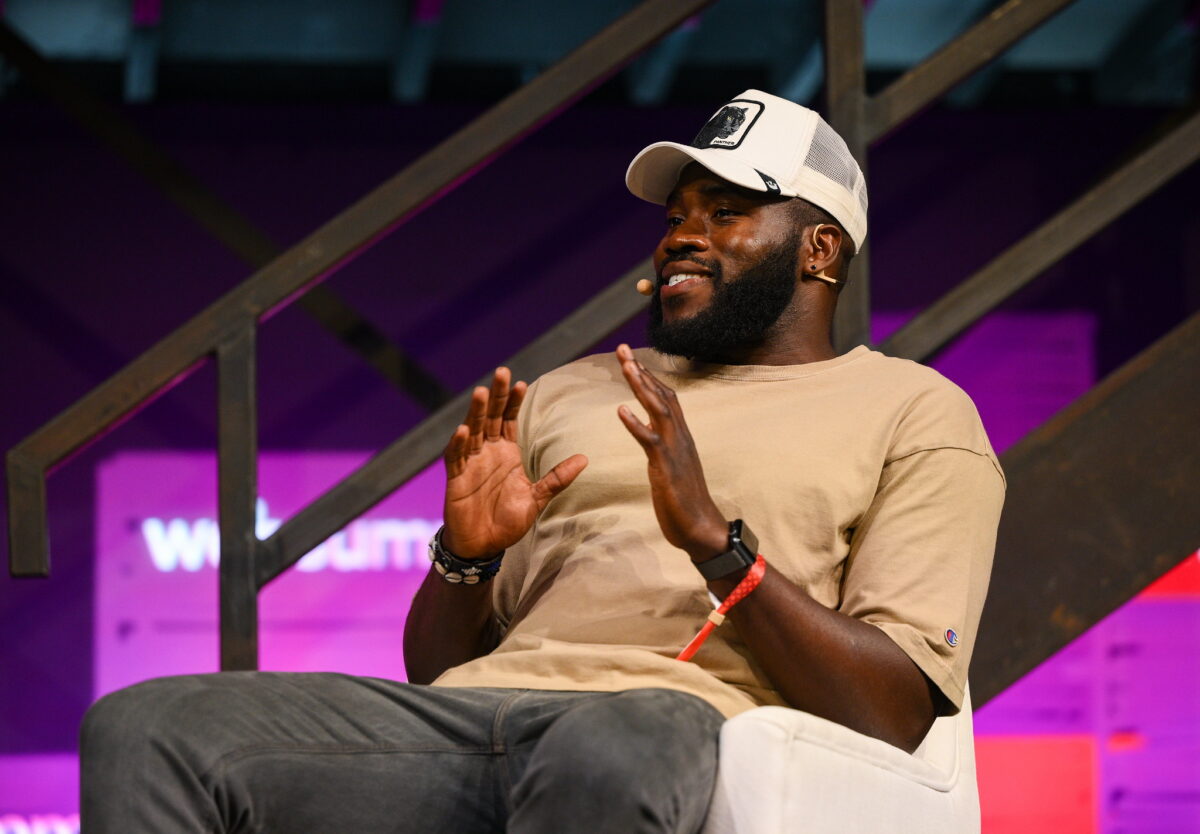 Martins Imhangbe speaking on the ContentMakers Stage at Web Summit 2022 in Lisbon, Portugal