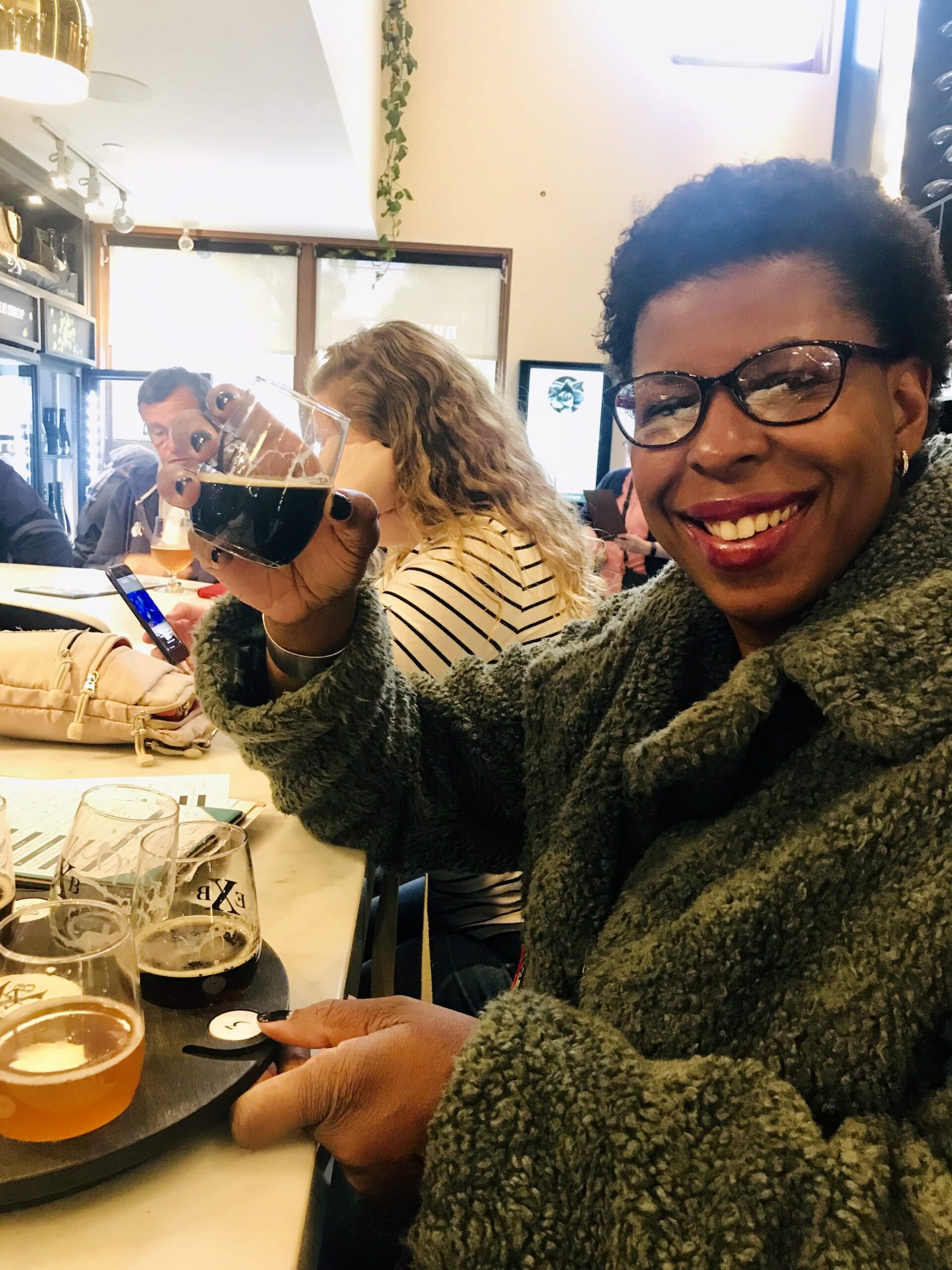 Mercedes Diane Griffin Forbes enjoying craft beer at The Exchange brewery in Canada