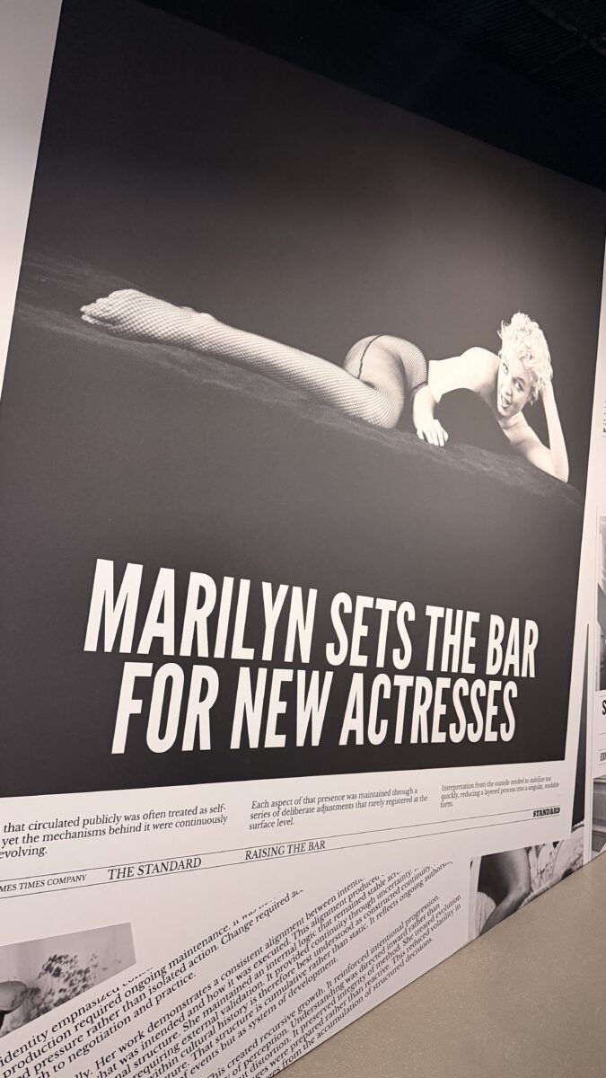 Marilyn Monroe photograph with the quote “Marilyn Sets the Bar for New Actresses” at the Manifesting Marilyn exhibition at Genesis House in New York City.