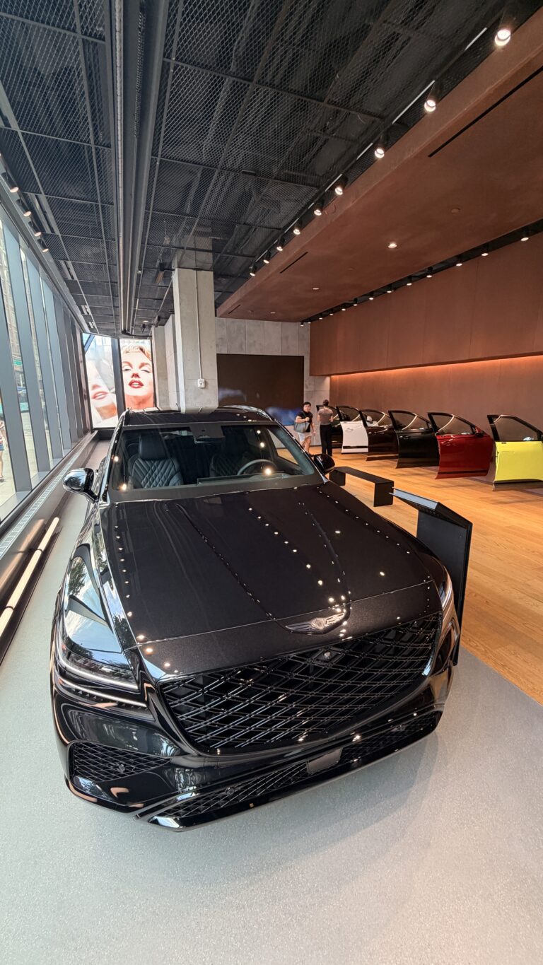 Genesis luxury vehicle displayed inside Genesis House during the Manifesting Marilyn exhibition in New York City.