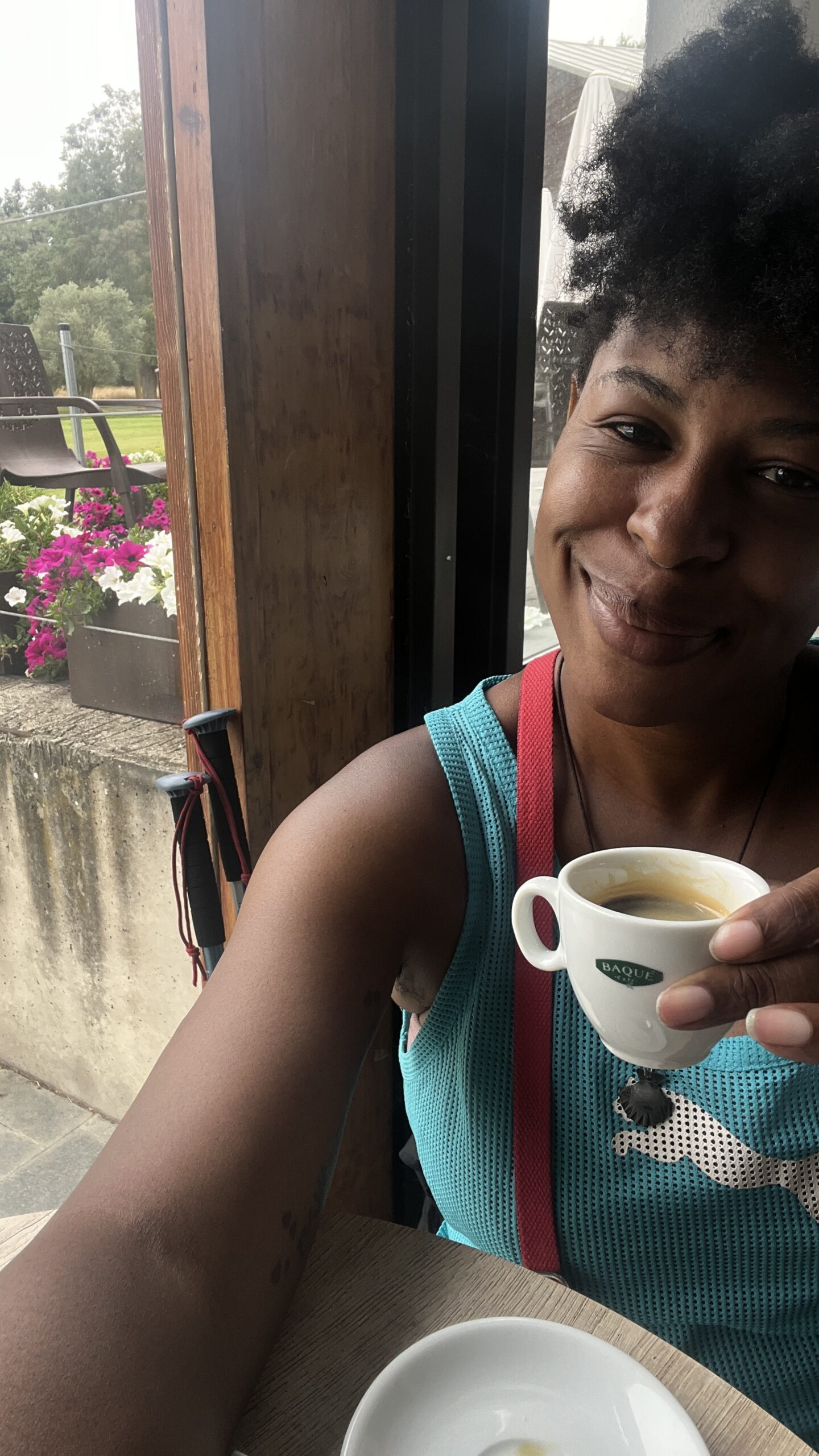 Mercedes enjoying coffee during her Camino journey