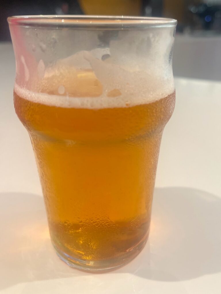 Glass of Loira Portuguese pilsner by A Fábrica Brewpub served in Portugal.