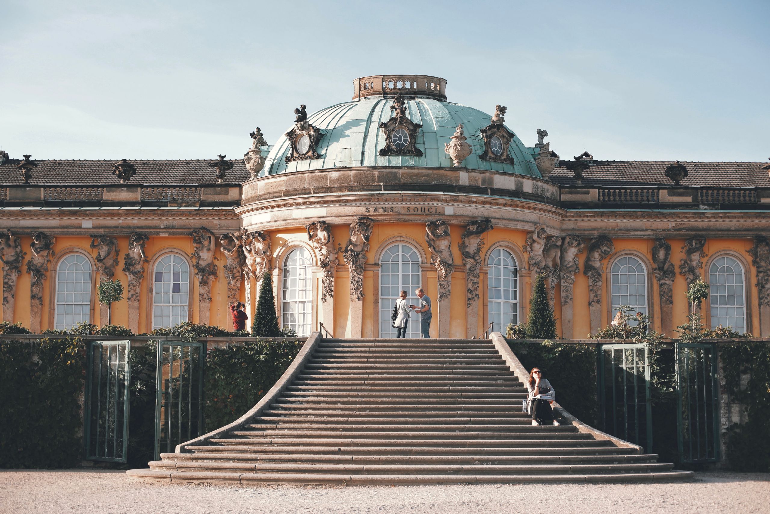 Explore the iconic Sanssouci Palace with its stunning architecture and historical charm in Potsdam, Germany.