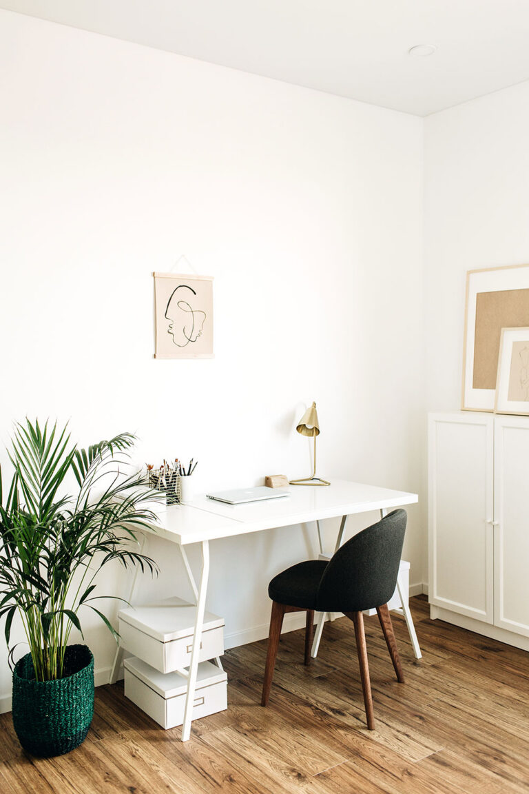 White desk in a white room.
