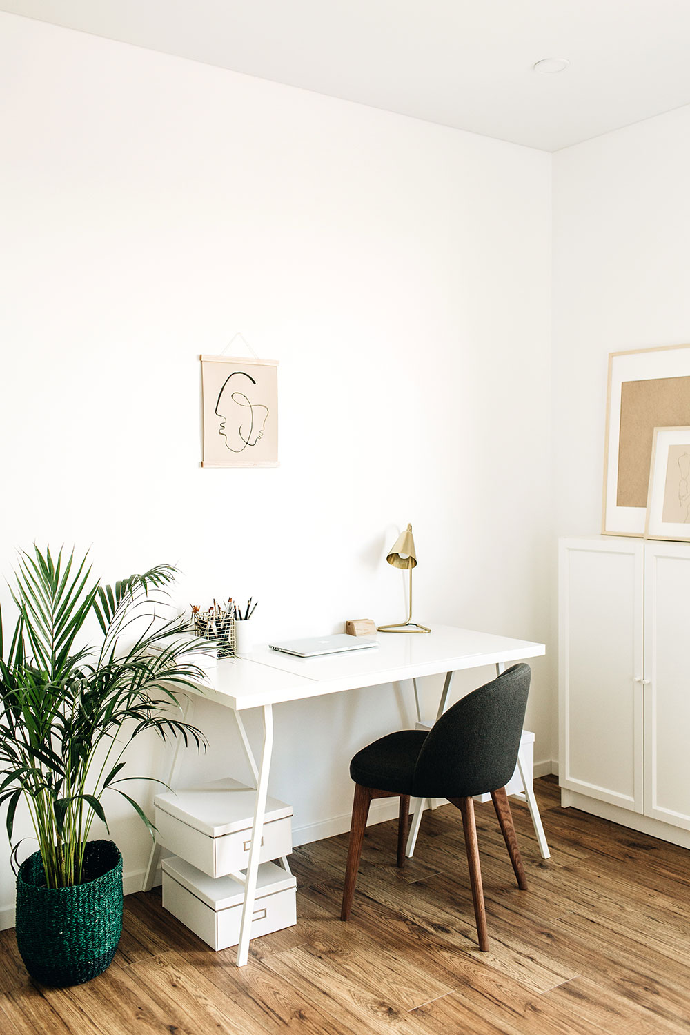 White desk in a white room.
