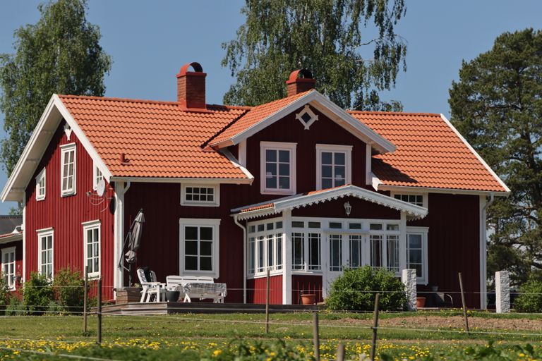 Hosting in Remote or Rural Areas - Charming Swedish house with orange roof in a lush green setting, Jönköping, Sweden.