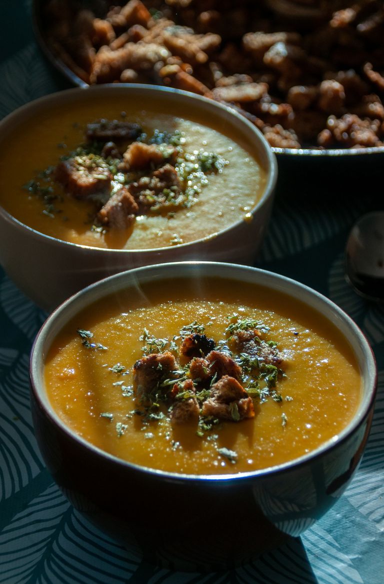 Soup on a Cold Day Is a Kind of Mercy - Delicious pumpkin soup served in bowls with croutons, perfect for a cozy autumn meal.
