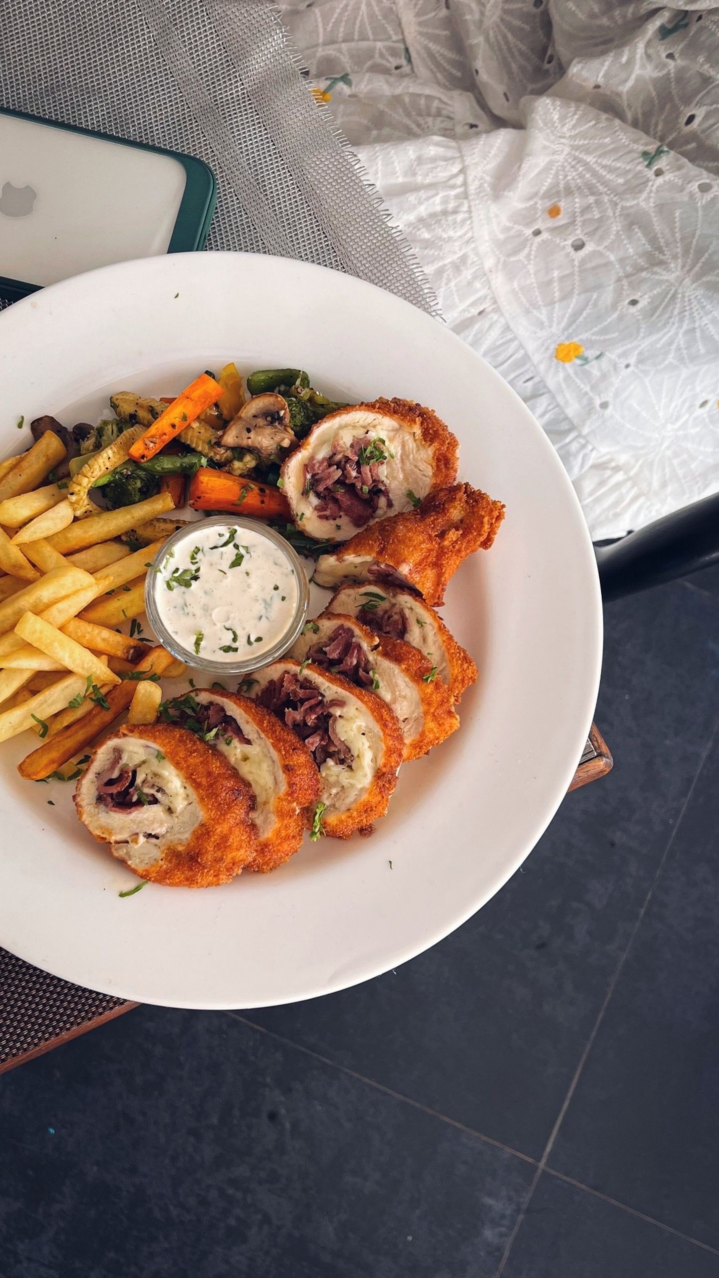 The Dish That Makes the Whole Room Quiet - Delicious crispy chicken rolls served with fries and grilled vegetables on a plate.