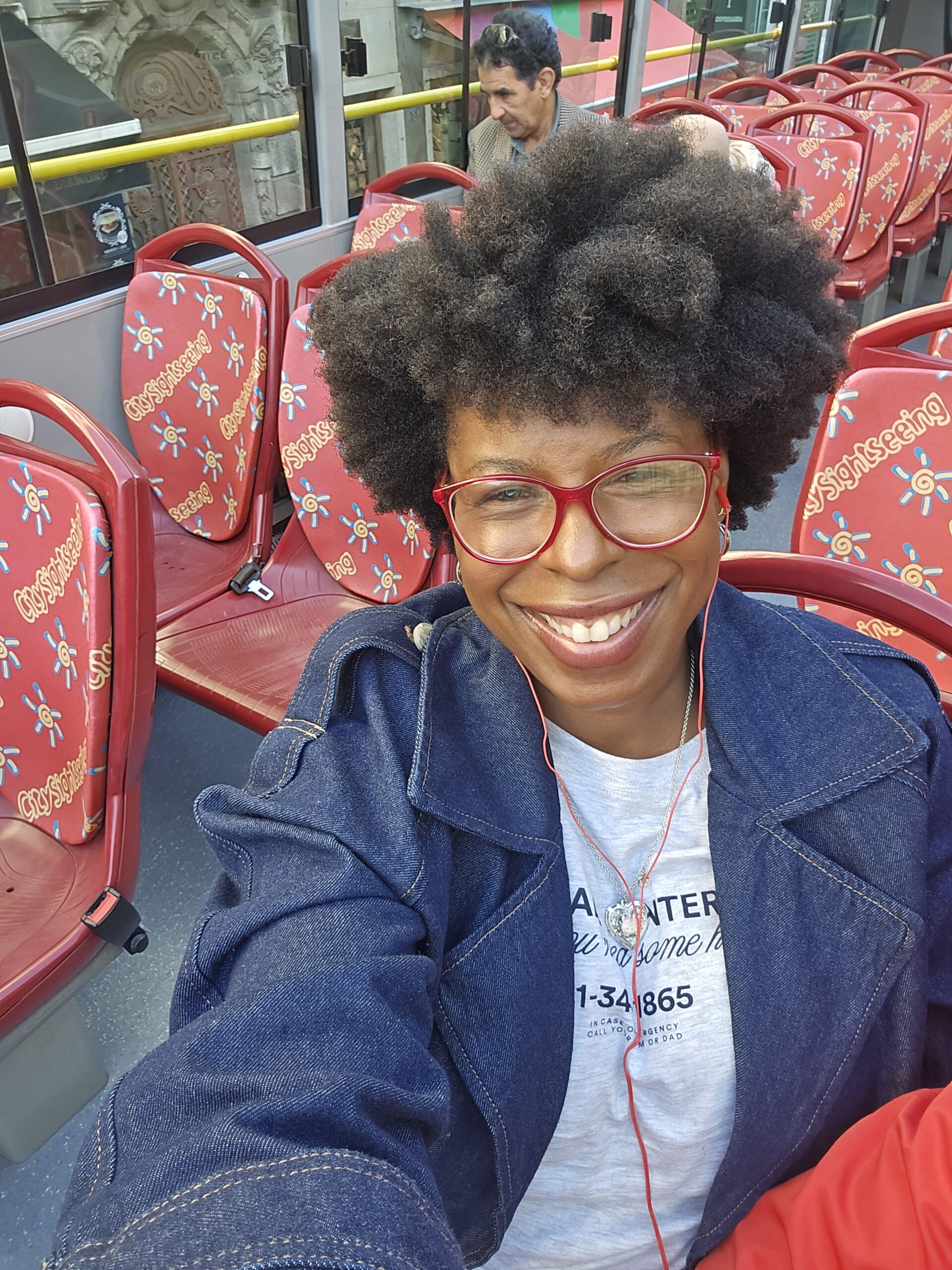 Mercedes on a sightseeing bus in Porto, Portugal - Why I Am Learning to Travel With More Tenderness